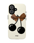 Sweet Sixteen Tough Phone Case with two black cherries and brown bow on silky beige background full covering the device from our collection Mini Cocktail
