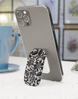 Muse Phone Grip featuring black floral designs on white background in glossy or matte finish