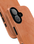 Solid dark orange Tough Phone Case with rustic rusty lines, part of the Pumpkin Pie collection for a rugged and seasonal style.