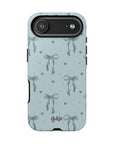 My Blues Tough Case with vintage-blue bow pattern, glossy or matte finish, shock protection, and wireless charging compatibility.