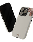 Phone case with floral design on a white background