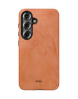 Solid dark orange Tough Phone Case with rustic rusty lines, part of the Pumpkin Pie collection for a rugged and seasonal style.