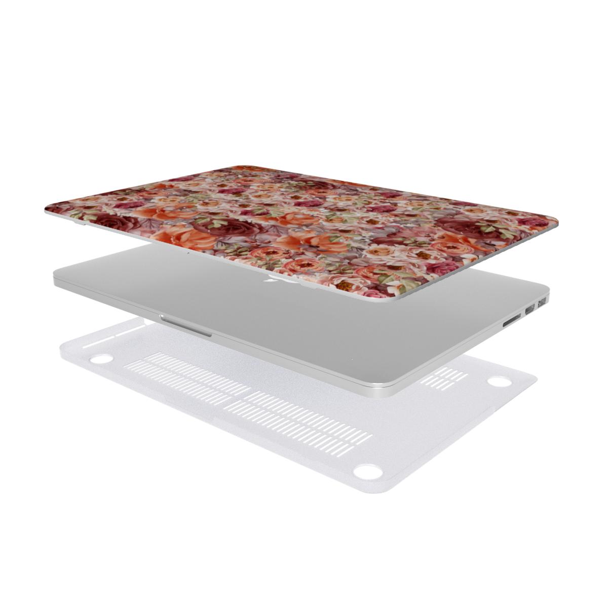 Laptop with floral skin on a white background