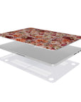 Laptop with floral skin on a white background