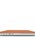 Vibrant orange Pumpkin Pie MacBook case with rustic rusty lines, designed for seasonal style and durable protection.