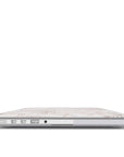 Delicate floral pattern on a lightweight, protective Pale Bouquet MacBook case with soft blush tones and lasting non-fade prints.