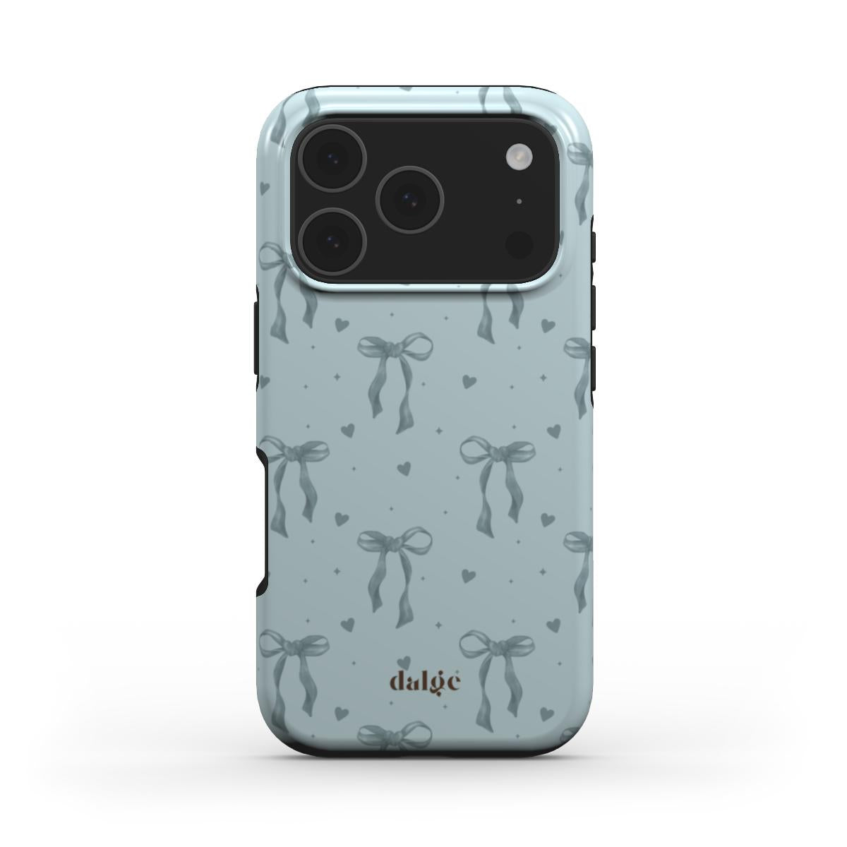 Close-up of the glossy My Blues Tough Phone Case with delicate vintage-blue bows and scattered hearts pattern.