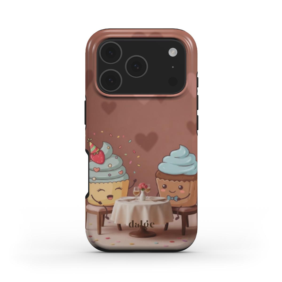 Sprinkles on a Date Tough Phone Case showcasing two smiling cupcakes at a café table with hearts, full wrap artwork and impact-resistant layers.