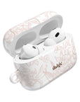 Pale Bouquet Earbuds Case – Slim, glossy protective cover featuring delicate floral lines in soft blush tones for AirPods.