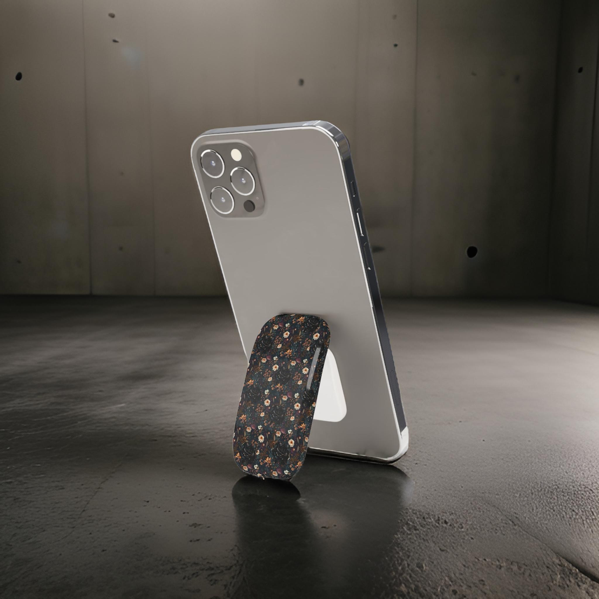 Mysterious Garden Phone Grip featuring dark floral designs giving secure and stylish grip .