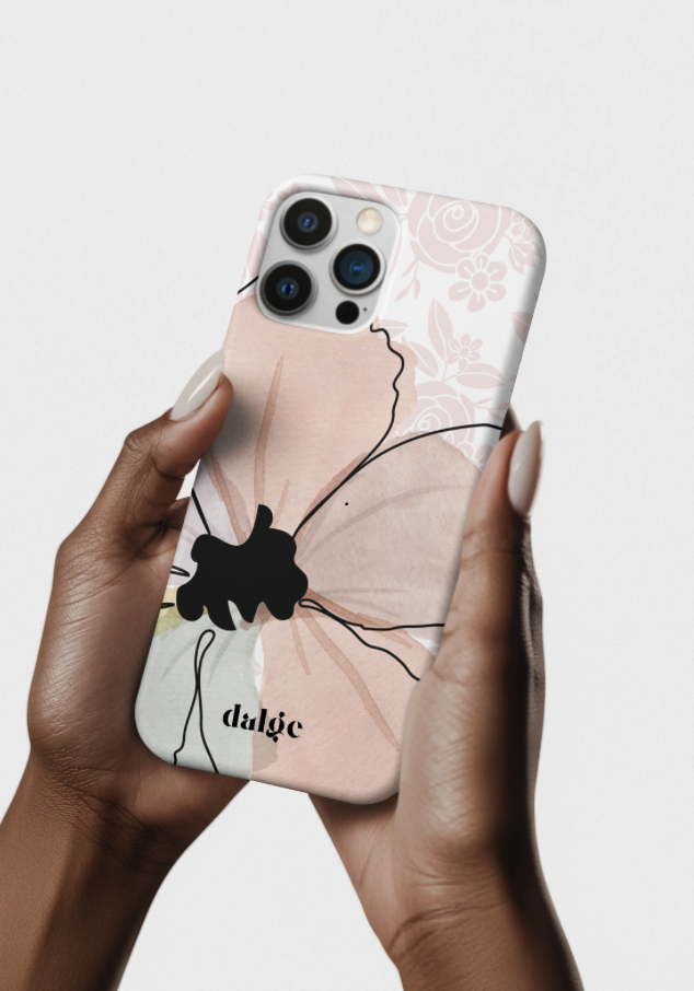 A person holding an iPhone with a floral and abstract butterfly-themed phone case, with the brand name 'dalge' visible on the design, against a plain light background